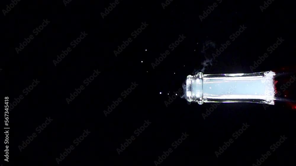 Super slow motion shot of champagne explosion, opening champagne bottle closeup. Filmed on high speed cinema camera, 4k1000fps Super slow motion shot of champagne explosion, opening champagne bottle closeup. Filmed on high speed cinema camera, 4k1000fps