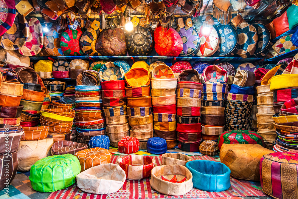 Variety of leather poufs sold in huge shop next to tannery in Fes, Morocco, Africa
