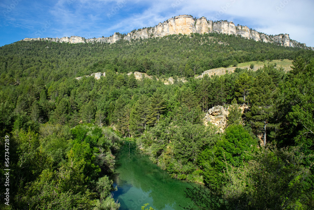Mountainous landscape with a river running through the valley