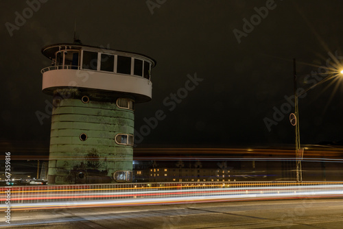 Copenhagen, Denmark, The landmark Knippels bridge and control tower at night with traffic.
