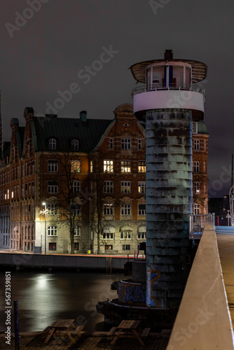 Copenhagen, Denmark, The landmark Knippels bridge and control tower at night with traffic. photo