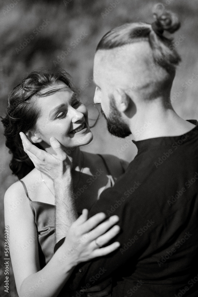 Fototapeta premium pregnant girl and boyfriend on high hills