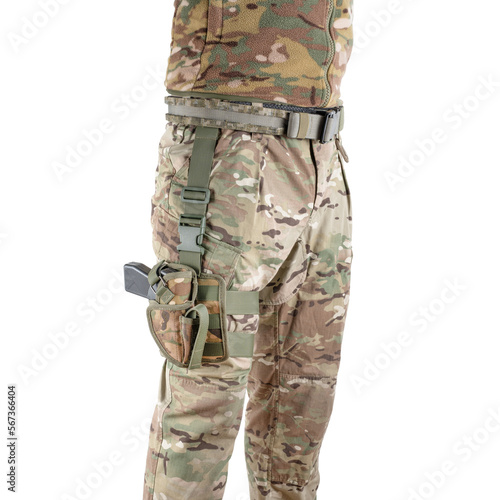 Soldier wearing uniform with gun in holster. Military concept. Armed forces equipment.
