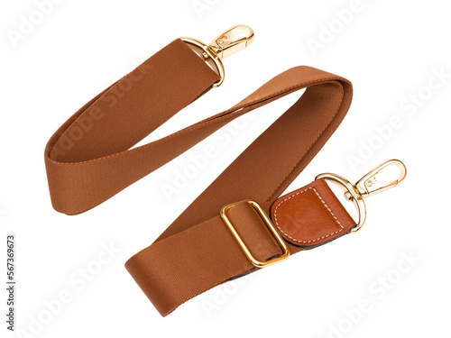 Brown fabric strap for a bag with gold hardware and leather inserts. Isolated on white background