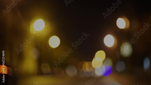 Wallpaper Mural Blurred footage of transport. Blur of city lights along the road, out of focus light at night. Traffic on the road of the night city, beautiful background. Torontodigital.ca