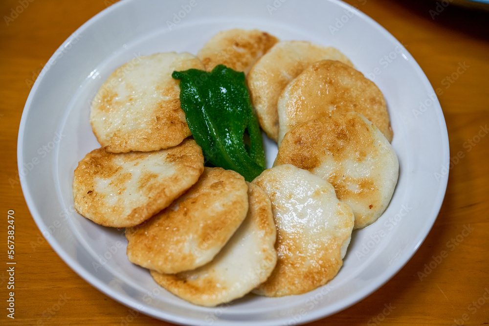 A plate of golden and delicious hand-made cuttlefish cake A plate of golden and delicious hand-made cuttlefish cake