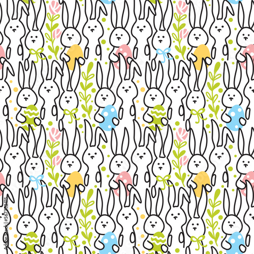 Cute rabbits with colored eggs on the lawn. Easter holiday. Seamless patter. Vector.