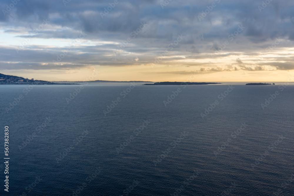 Sunrise over bay of Cannes with Cap d'Antibes and Iles de Lerins, France