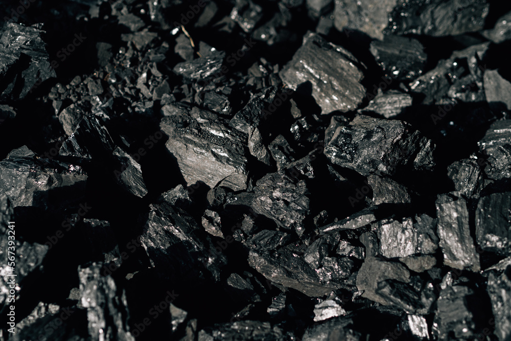 Close-up of black coal stones. fuels and minerals.. Close-up of black coal stones. fuels and minerals..