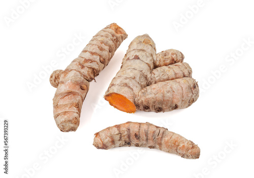 Close-up of turmeric roots isolated on white background