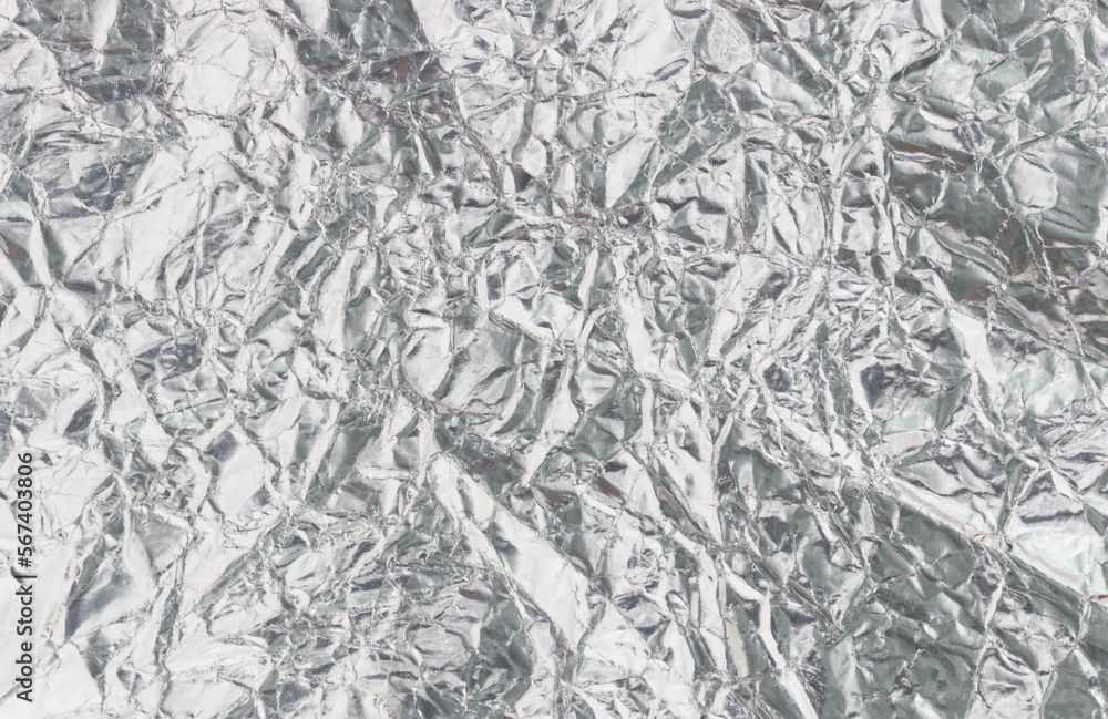abstract crumpled silver foil background abstract crumpled silver foil background