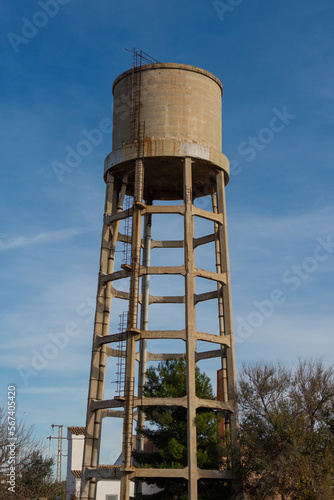 Old water tank isolated with blue sky