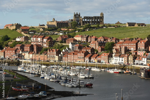 Whitby harbour and abbey ruins, Whitby, Yorkshire, England, United Kingdom, Europe photo
