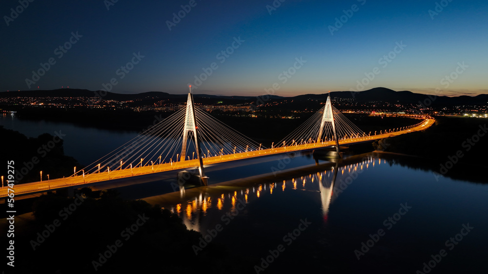 city and bridge by night