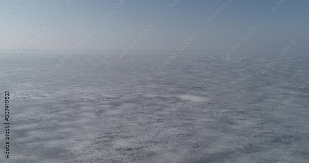 Frozen Kiev Sea. Winter. Sunny frosty morning. Fishermen on the ice. Vyshgorodsky district. Ukraine. Aerial Frozen Kiev Sea. Winter. Sunny frosty morning. Fishermen on the ice. Vyshgorodsky district. Ukraine. Aerial