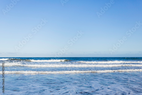 dark blue ocean waves on the beach