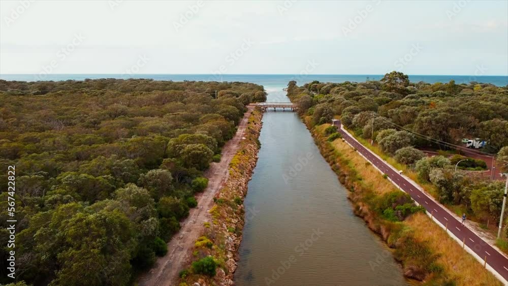 Aerial view of wetlands forest and river near estuary in western Australia. Drone view of Vasse-Wonnerup estuary in Busselton, Australia. Aerial view of wetlands forest and river near estuary in western Australia. Drone view of Vasse-Wonnerup estuary in Busselton, Australia.