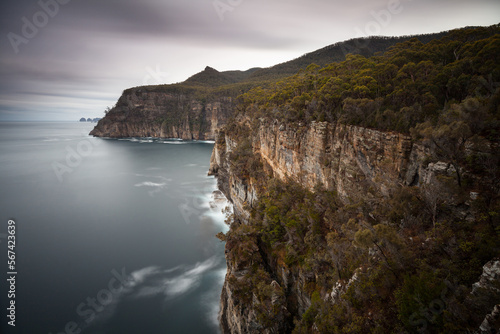 The cliffs of Waterfall Bay, Tasmania - on the horizon Cape Hauy - The Laterns