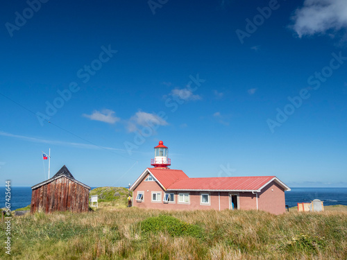 The Cape Horn lighthouse and small chapel at Cape Horn, Cabo de Hornos National Park, Hornos Island, Chile, South America photo