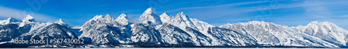 Wide Panorama of snow covered Grand Teton Mountains near Jackson Wyoming.