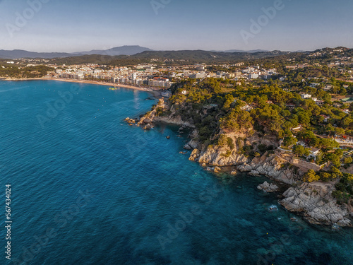 Fototapeta Naklejka Na Ścianę i Meble -  Aerial view to Spanish coast of Costa Brava in Lloret de Mar, Catalonia, popular travel destination by the sea