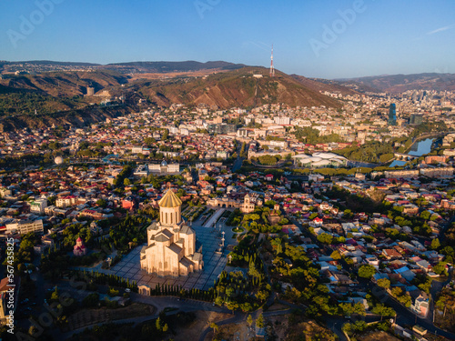 Holy Trinity Church overlooking main sights of Peace Bridge, Mother of Georgia, and the Old Town, Tbilisi, Georgia (Sakartvelo), Central Asia, Asia photo