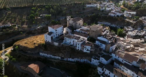 Setenil de las Bodegas - Beautiful Andalusian Village Of White Houses In Spain - aerial drone shot photo