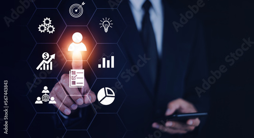 Slika na platnu Businesspeople touching on screen to target customer