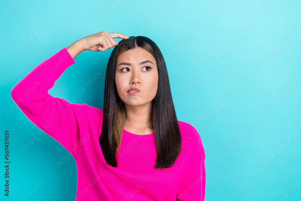 Photo of young beautiful smart minded woman wear pink knitted sweater scratch head choosing look empty space isolated on aquamarine color background Photo of young beautiful smart minded woman wear pink knitted sweater scratch head choosing look empty space isolated on aquamarine color background