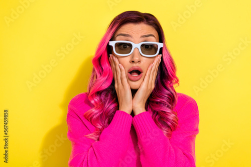 Photo of impressed terrified person hands touch cheeks open mouth isolated on yellow color background