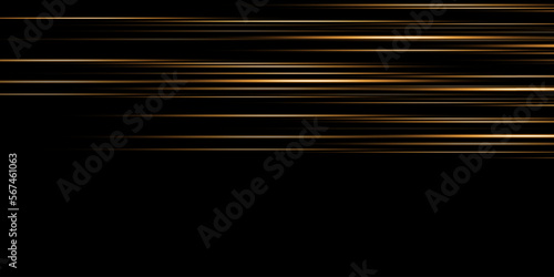 Golden lines of light, speed movement on a black background.