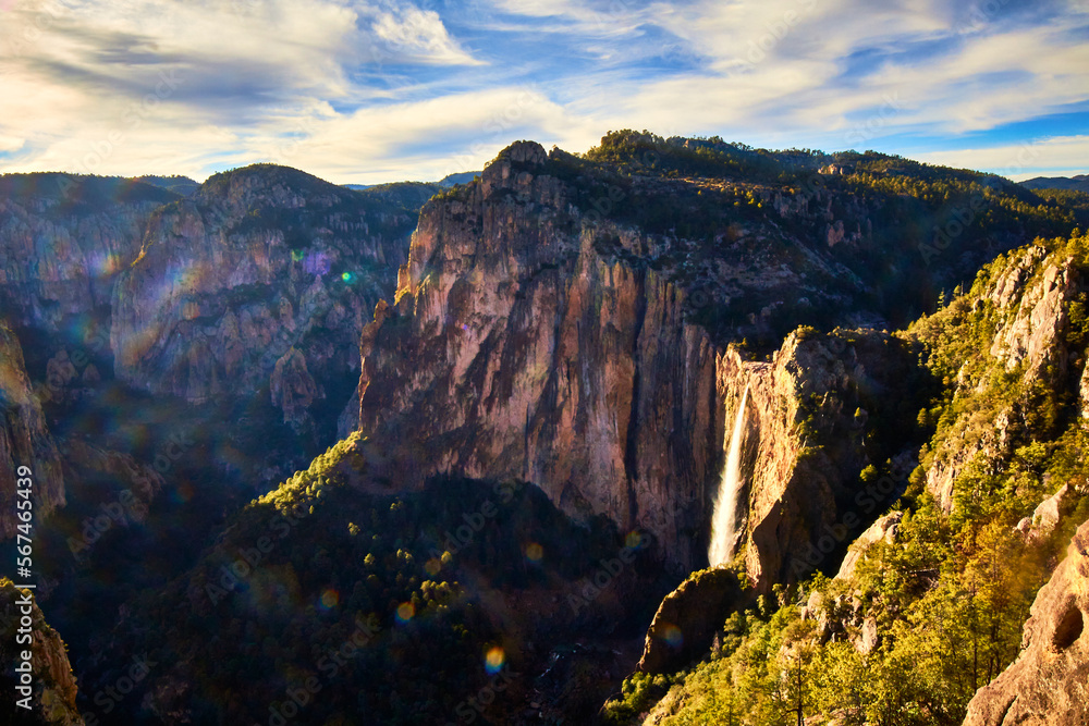 amazing canyon with waterfall in the background and dramatic sky in sierra tarahumara, basaseachi chihuahua 