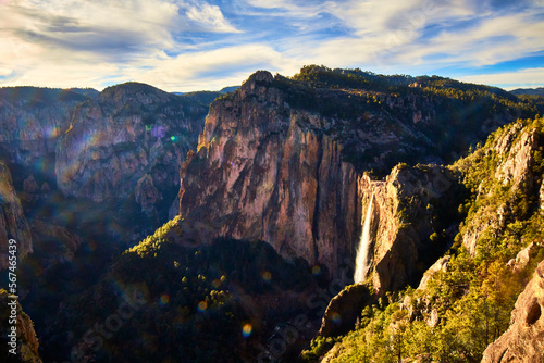 amazing canyon with waterfall in the background and dramatic sky in sierra tarahumara, basaseachi chihuahua 