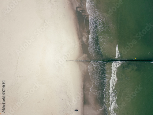 Top down drone shot of Baltic sea shore. Near Kołobrzeg.