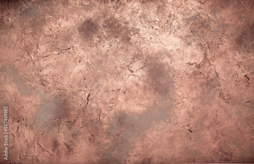 Background wall with abstract spots. Beautiful brown, bronze texture with stains, abstract surface background, modern bright painting of walls in trending shades, unusual spotty silver and gold surfac