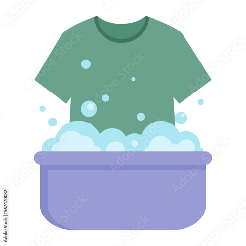 T-shirt in a basin with soapy water is washed by hands