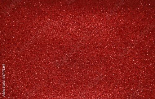 Red glitter background. Christmas shiny background. 