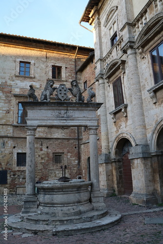 Old fountain at Piazza Grande in Montepulciano, Tuscany Italy