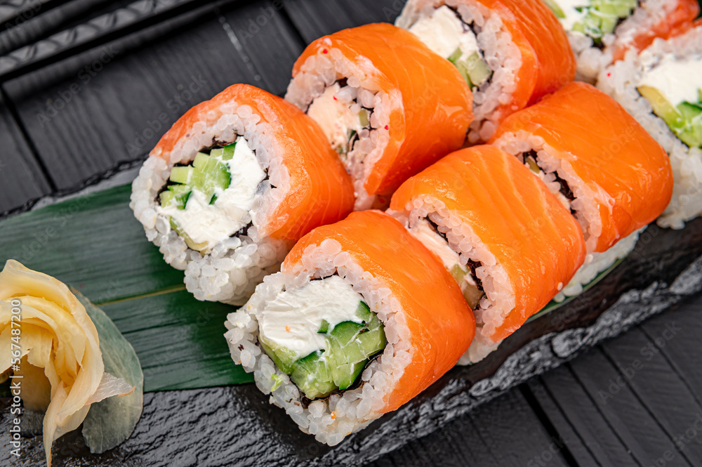 Classic Philadelphia sushi roll set with salmon and cream cheese. Classic Philadelphia sushi roll set with salmon and cream cheese.