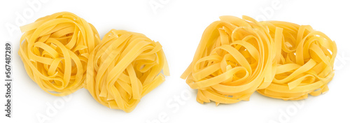 Raw tagliatelle pasta isolated on white background with full depth of field. Top view. Flat lay