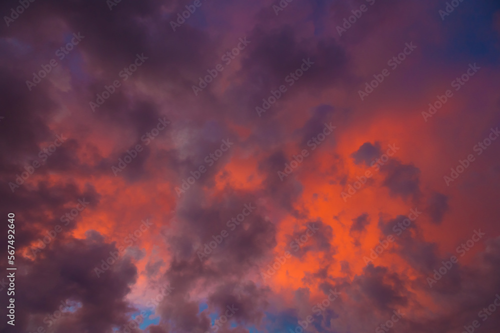 Background of sunset a dark red sky with purple clouds.