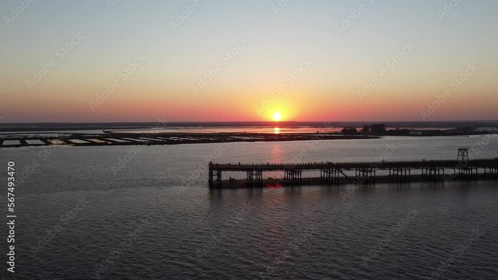 Aerial view of a sunset at the Riotinto pier in Huelva, Andalusia (Spain) Aerial view of a sunset at the Riotinto pier in Huelva, Andalusia (Spain)