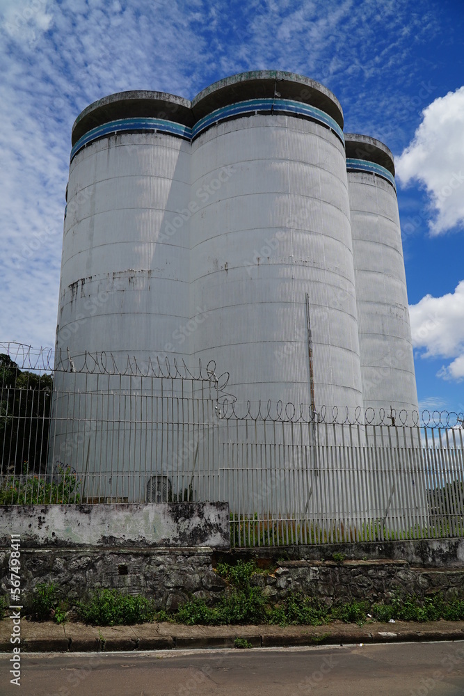 Water reservoir tower in Manaus with 6 tall water silos built side by side. São Jorge district, Manaus, Amazonas state, Brazil.
