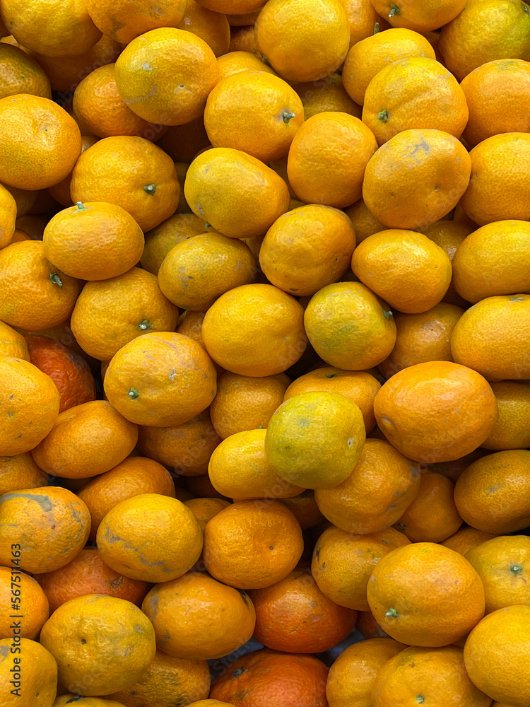 Big lot of fresh organic mandarins