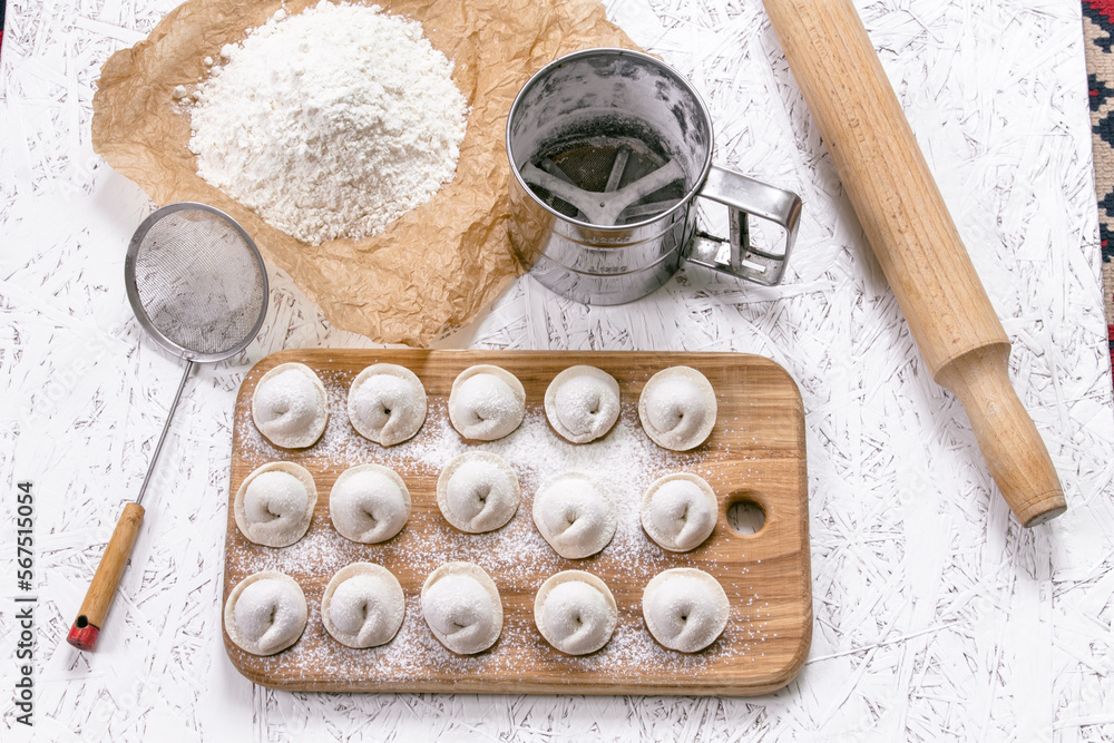 Fototapeta premium Dumplings. Traditional dough dish. White background.