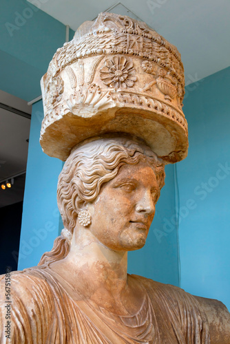 Caryatide of Eleusis, Greece, as exhibited in the modern Eleusis museum. This is a one of the original two Caryatides of Small Propylaea of Eleusis, the other is being exhibited in Cambridge, England. photo