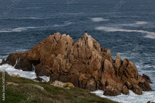 rock on the coast of galicia in the north of spain a cloudy day photo