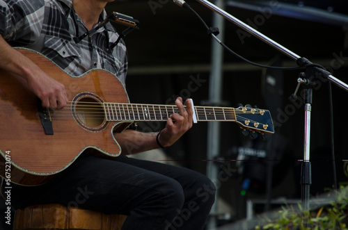 musician guitarist on stage of live music festival