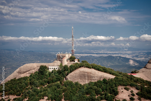 Cell tower (Base station or base radio station) on the top of Montserrat, Mountain, Catalonia, Spain. View from above. Aerial view.