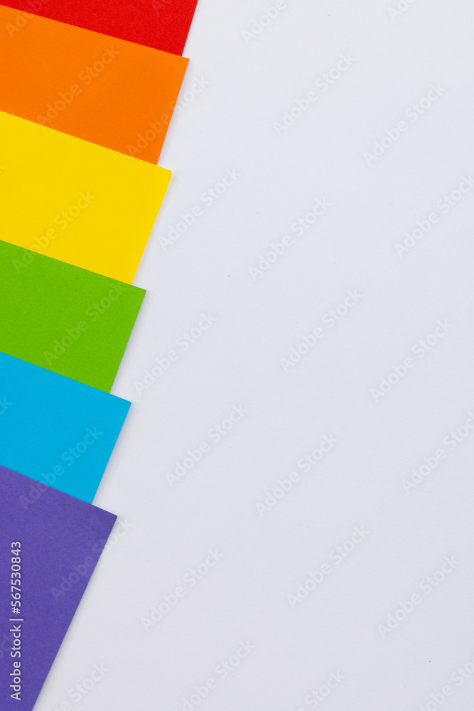 Close up of rainbow coloured cards with copy space on white background Close up of rainbow coloured cards with copy space on white background